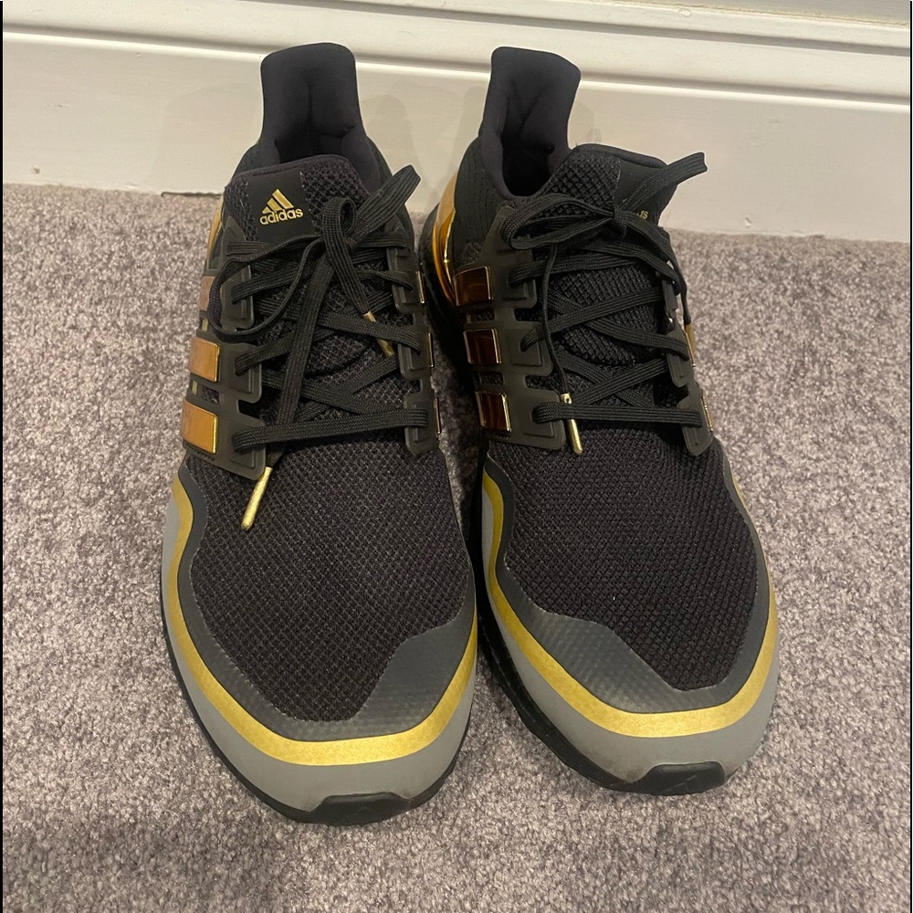 Adidas Mens Ultra Boost size 12 athletic shoes.